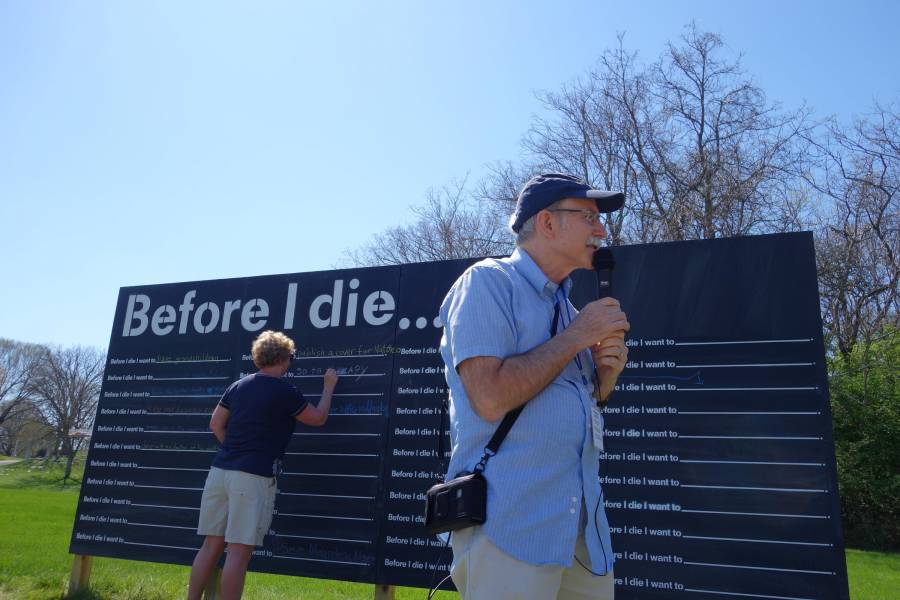 Tom Davis, 62, starts his tour of Crown Hill Cemetery at the Before I Die Wall. Davis suffered a heart attack on March 22.