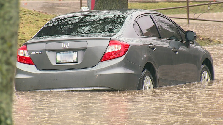 A parked car in high flood waters in Bloomington on Feb. 17, 2019.  - FILE PHOTO: Steve Burns/WTIU