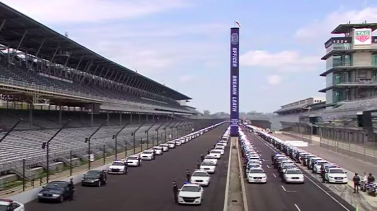 Members of the IMPD line the Indianapolis Motor Speedway during services for Officer Breann Leath. - Screen shot of IMPD broadcast provided on YouTube