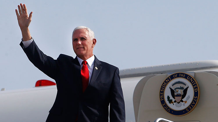Vice President Mike Pence waves as he arrives at Jorge Chavez international airport in Lima, Peru on April 13. Pence is scheduled visit Indianapolis Thursday. - AP Photo/Karel Navarro