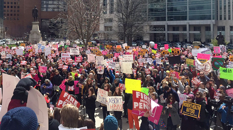 People rally outside the Statehouse in 2016 over an Indiana anti-abortion law. - File photo: Brandon Smith/IPB News