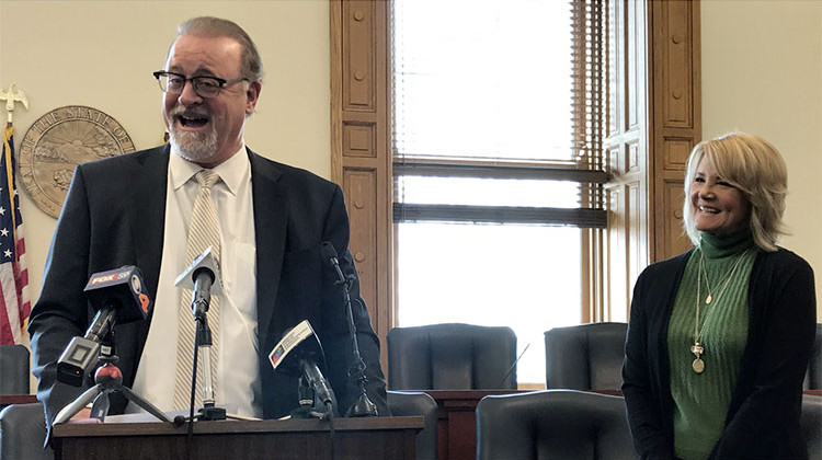 Sen. David Long (R-Fort Wayne), alongside his wife Melissa, announced his retirement at a press conference in February. It takes effect Nov. 6. - Brandon Smith/IPB News