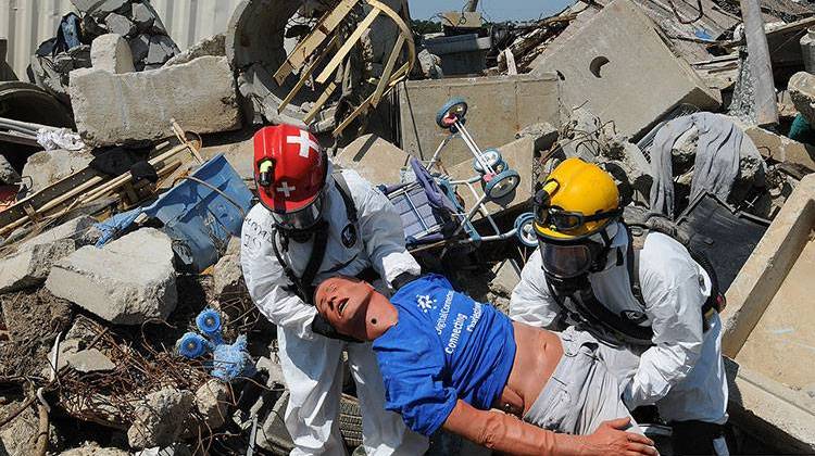 Rescue workers pull a simulated victim from the rubble at the Muscatatuck Urban Training Center during an exercise in July 2012. - U.S. Army photo by Staff Sgt. Keith Anderson