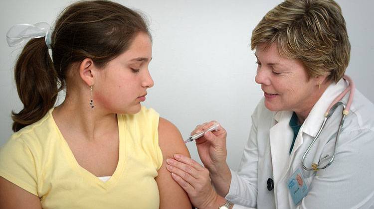 The state can create laws requiring students get vaccines before attending public universities, but private schools donâ€™t need to require students to have any immunizations. - stock photo