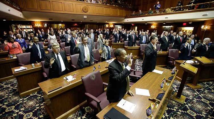 Indiana House members take the oath of office during Organization Day at the Statehouse in Indianapolis, Tuesday, Nov. 18, 2014. - AP Photo/AJ Mast