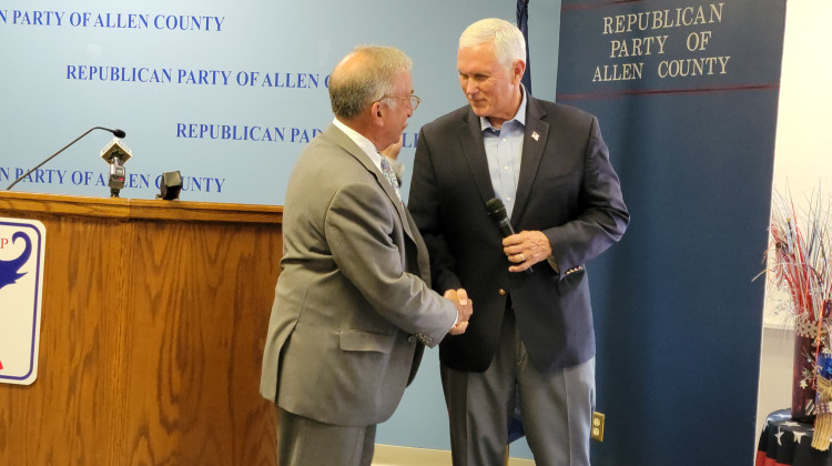 Former Vice President and current GOP presidential candidate Mike Pence shakes hands with Allen County Republican Party Chairman Steve Shine - Tony Sandleben