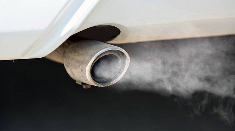 Exhaust from idling vehicles contributes to ground-level ozone. - stock photo