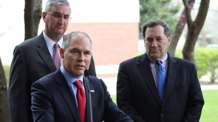 U.S. EPA Administrator Scott Pruitt reads a statement to reporters during a visit to East Chicago in April, alongside state and local officials including Gov. Eric Holcomb and U.S. Sen. Joe Donnelly.  - Nick Janzen/IPB News