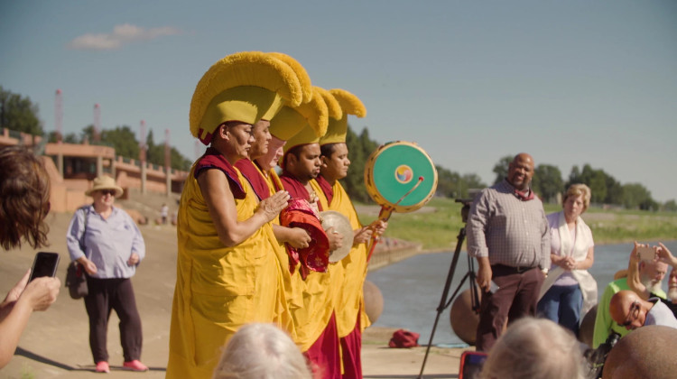 On August 30, Exiled Tibetan Monks from Tashi Kyil monastery in India complete a ritual in which they pour sand into the Ohio River. The sand had been used to create a sand mandala, an artform to promote world peace that took four days to create. - Tim Jagielo
/
WNIN Video Still