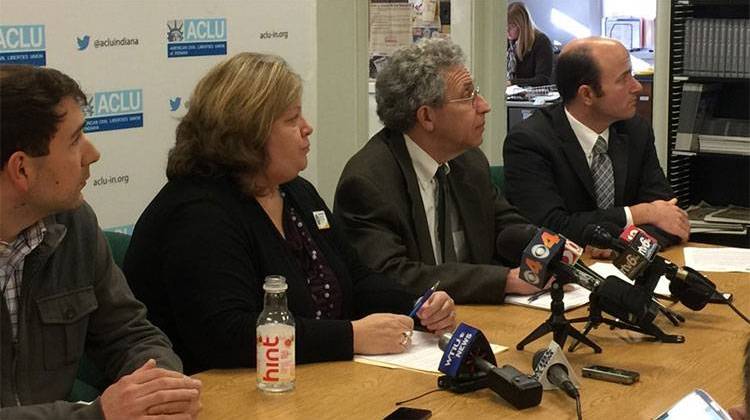 ACLU of Indiana Legal Director Ken Falk (second from right) and Exodus Refugee Immigration Executive Director Carleen Miller (second from left) discussed the lawsuit at a press conference Tuesday. - Steve Burns/IPBS