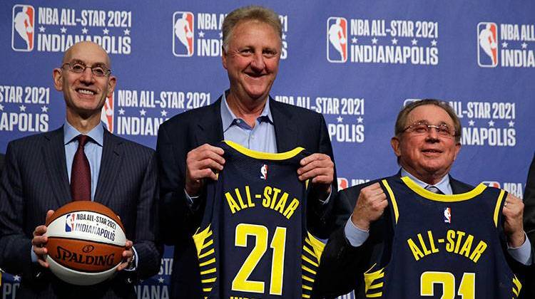 NBA Commissioner Adam Silver, left, is joined by Indiana Pacers owner Herb Simon, right, and Larry Bird, after he announced in Indianapolis, Wednesday, Dec. 13, 2017 that Indianapolis will host the 2021 NBA All-Star game . - AP Photo/Michael Conroy