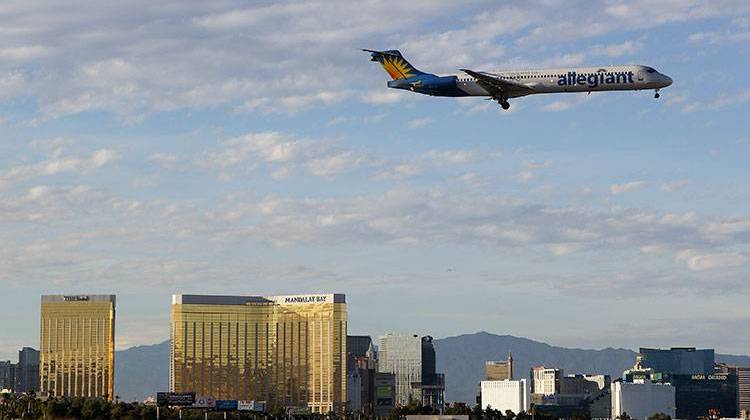 An Allegiant Air flight prepares to land at McCarran International Airport  in Las Vegas.  - AP Photo/Julie Jacobson
