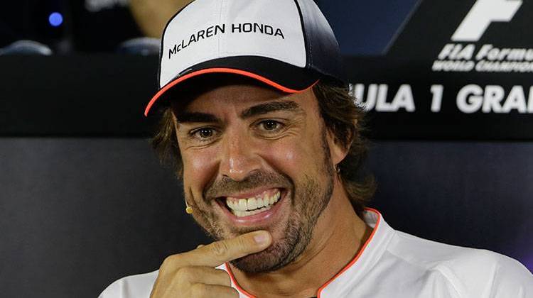 McLaren driver Fernando Alonso of Spain will forgo the Monaco Grand Prix to compete in the 101st Indianapolis 500. - AP Photo/Luca Bruno