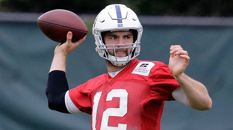 FILE - In this Oct. 6, 2017, file photo, Indianapolis Colts quarterback Andrew Luck throws during NFL football practice in Indianapolis. Head coach Frank Reich says Andrew Luck is throwing footballs again after recovery from shoulder surgery kept him out all of the 2017 season. - AP Photo/Darron Cummings, File