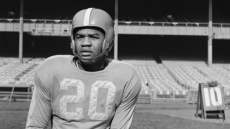 FILE - In this Nov. 2, 1950, file photo, New York Yanks football player George Taliaferro poses in New York. Taliaferro, a standout running back for Indiana who became the first black player to be drafted by an NFL team when George Halas and the Chicago Bears took him in the 13th round of the NFL draft, has died. - AP Photo/Murray Becker