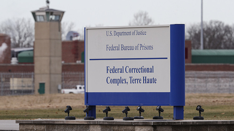 The guard tower flanks the sign at the entrance to the U.S. Penitentiary in Terre Haute, Ind., in Terre Haute, Ind., Tuesday, Dec. 10, 2019. The facility houses a Special Confinement Unit for male federal inmates who have been sentenced to death as well as the federal execution chamber.  - AP Photo/Michael Conroy
