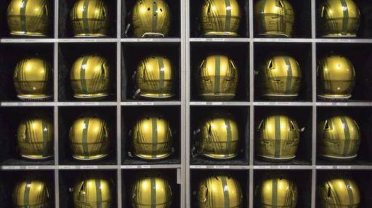 Notre Dame football helmets sit in a travel case after an NCAA college football game against Army, Saturday, Nov. 12, 2016, in San Antonio.  - AP Photo / Darren Abate