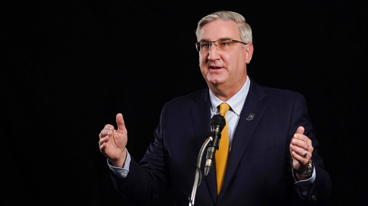 Indiana Republican Gov. Eric Holcomb participates in the Indiana Gubernatorial debate with Democrat Woody Myers and Libertarian Donald Rainwater, Tuesday, Oct. 27, 2020, in Indianapolis. The candidates were in separate studios to allow for social distancing guidelines. - AP Photo/Darron Cummings