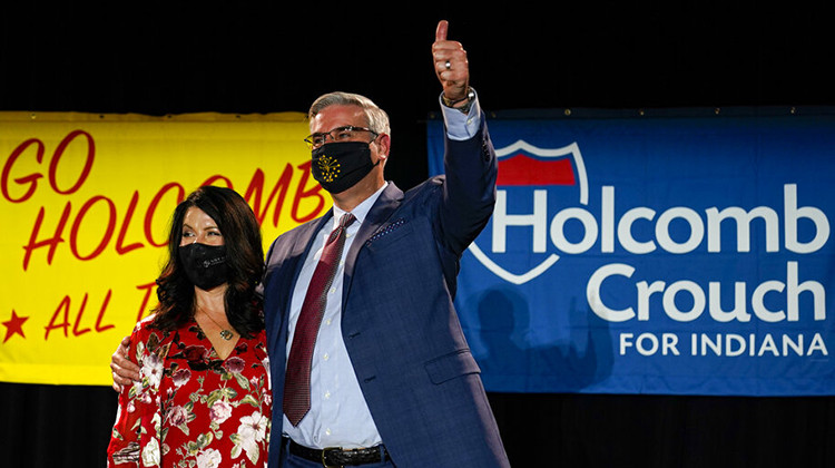 Indiana Gov. Eric Holcomb is joined by his wife Janet after he addressed supporters after winning his second term as governor in Indianapolis, Tuesday, Nov. 3, 2020.  - AP Photo/Michael Conroy