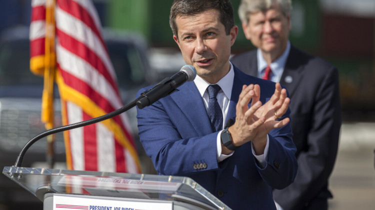 U.S. Transportation Secretary Pete Buttigieg speaks to the media during a visit to the Georgia Ports Authority's Megarail facility, Friday, Dec., 17, 2021 in Savannah, Ga. Buttigieg used the visit to highlight the coordination with the his department and the Georgia Ports Authority to improve its cargo flow.  - (AP Photo/Stephen B. Morton)