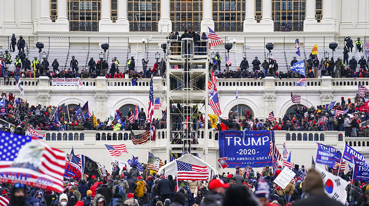FILE - Insurrectionists loyal to President Donald Trump breach the Capitol in Washington, Jan. 6, 2021.  - AP Photo/John Minchillo, File
