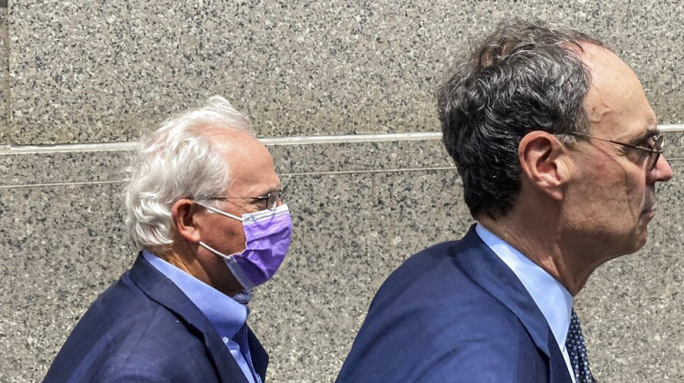 Former U.S. Rep. Stephen Buyer, left, trails his lawyer William Schwartz as he leaves Manhattan federal court after pleading not guilty to charges that he participated in an insider trading scheme while working as a consultant, Wednesday July 27, 2022, in New York. Buyer, who served in Congress from Indiana from 1993 through 2011, will be free on $250,000 bail while the case against him proceeds. - AP Photo/Larry Neumeister