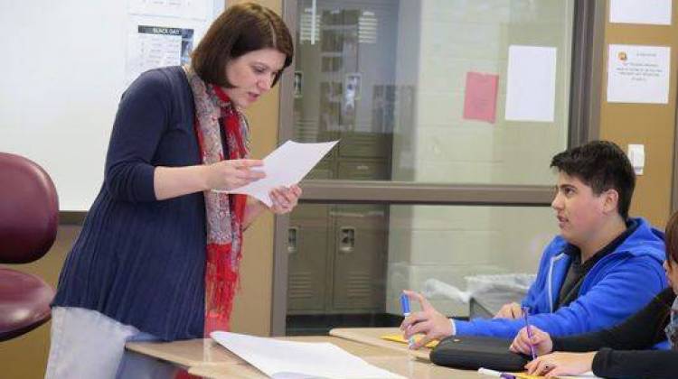 Amy Peddie, seen helping a student with an assignment at Southport High School, helped shape the English language learning program there. â€œIâ€™d never teach anything else now,â€ said Peddie, 39. â€œI love it.â€  - Shaina Cavazos/Chalkbeat Indiana