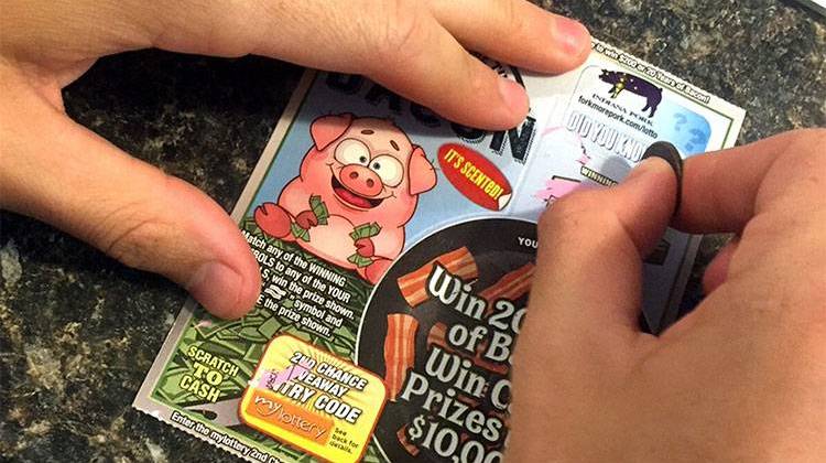 A top prize of this scented lottery ticket is $250 worth of bacon for 20 years. - TheStatehouseFile.com