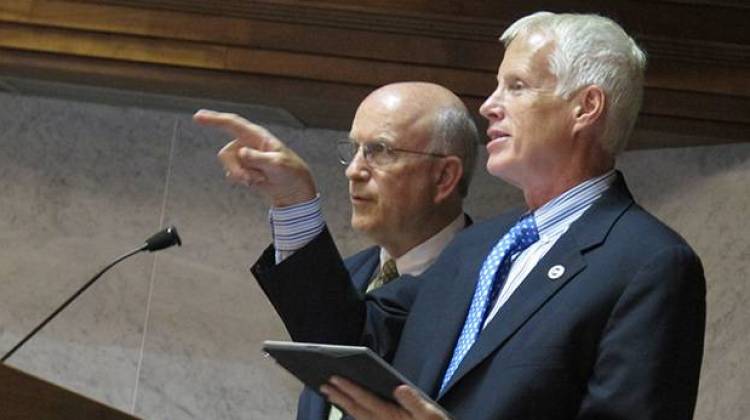 The state’s leading education lawmakers want to extend Pearson’s testing contract, to avoid rushing into a botched replacement for ISTEP+. In this 2013 file photo, House education committee chair Bob Behning (left) and Senate education committee chair Dennis Kruse attend a state panel. - Kyle Stokes/StateImpact Indiana