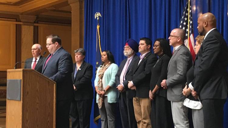 Flanked by a group of faith and community leaders, David Sklar of the Jewish Community Relations Council spoke Wednesday, March 15, 2017 at the Indiana Statehouse. - Michelle Johnson / WFYI