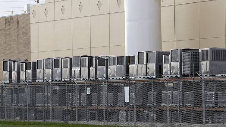 Air conditioning units are stacked outside the Carrier Corp. plant, Wednesday, Nov. 30, 2016, in Indianapolis.  - AP Photo/Darron Cummins