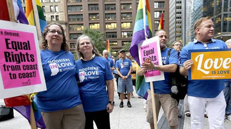 Supporters of gay marriage in Wisconsin and Indiana attend a rally at the federal plaza Monday, Aug. 25 in Chicago.  - AP Photo/Charles Rex Arbogast