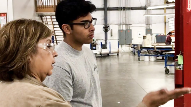 Chris Camacho, a youth apprentice in Elkhart County, learns about the operations of the factory on his first day. - FILE PHOTO: Justin Hicks/IPB News