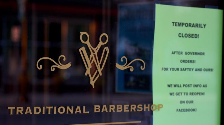 Boulanger's Barberie in South Bend displays a sign citing it's closure due to Gov. Eric Holcomb's "Stay-At-Home" order. - Justin Hicks/IPB News