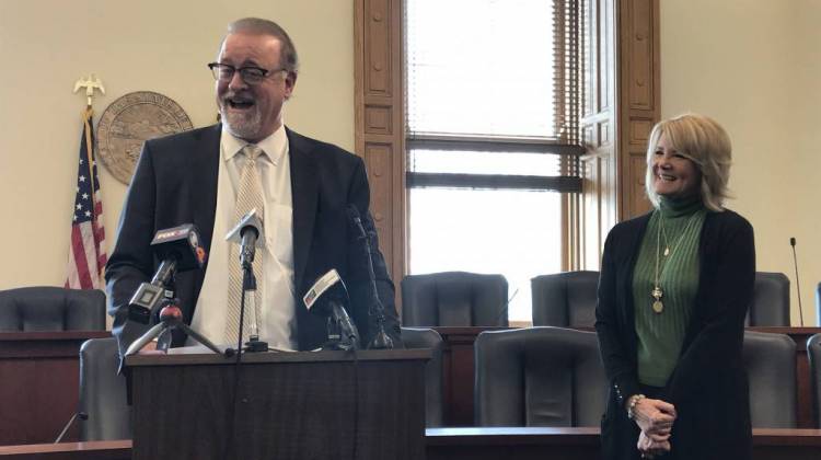 Sen. David Long (R-Fort Wayne) announces his retirement from the legislature with his wife Melissa alongside him. - Brandon Smith/IPB News