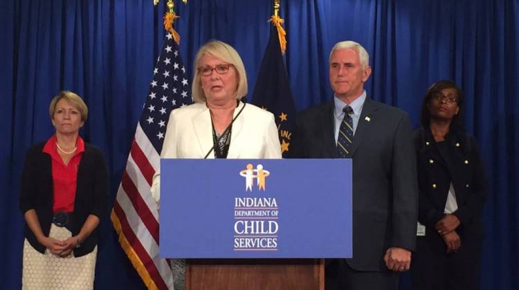 DCS director Mary Beth Bonaventura and Governor Mike Pence discuss caseloads at an August 2015 press conference. - Brandon Smith/IPBS