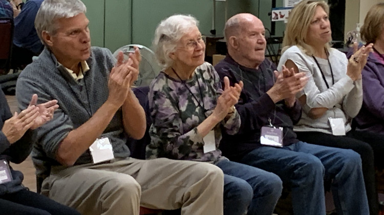 Members of the Song Shape Chorus rehearses in Carmel. It’s made up of 28 patients with early to mid stages of dementia and their caregivers.  - Jill Sheridan/IPB News