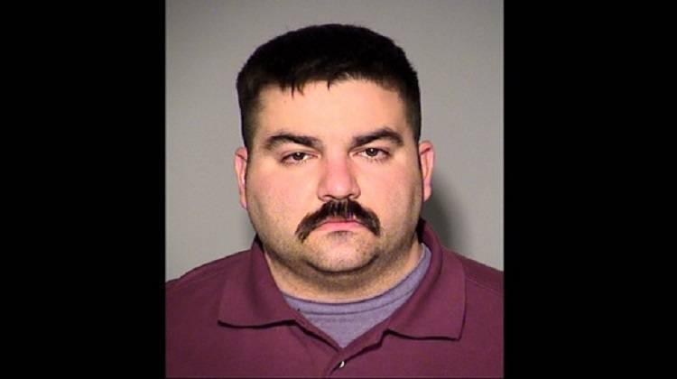 IMPD Officer Christopher Dickerson was arrested on three felony counts. - IMPD