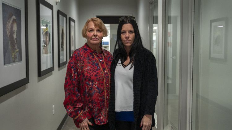 Des Moines attorney Roxanne Conlin (left), with her client, Sarah Dudley. Conlin took on a medical malpractice case filed by Sarah and her husband, Joe, after a physicians assistant at an urgent care clinic misdiagnosed Joe with the flu when he had bacterial meningitis. The infection caused permanent brain damage. A jury awarded the Dudleys $27 million in non-economic damages last year. - Natalie Krebs / Side Effects Public Media