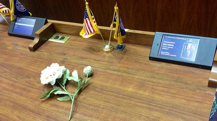 A flower sits on Rep. Ed Harris' desk in the Indiana House of Representatives. - Brandon Smith