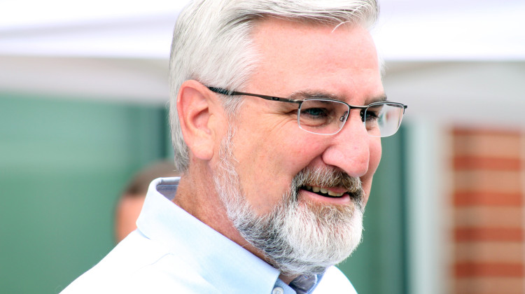 Gov. Eric Holcomb signed a letter to President Biden saying the ongoing federal public health emergency is negatively affecting states, "primarily by artificially growing our population covered under Medicaid, regardless of whether individuals continue to be eligible under the program." - Brandon Smith/IPB News