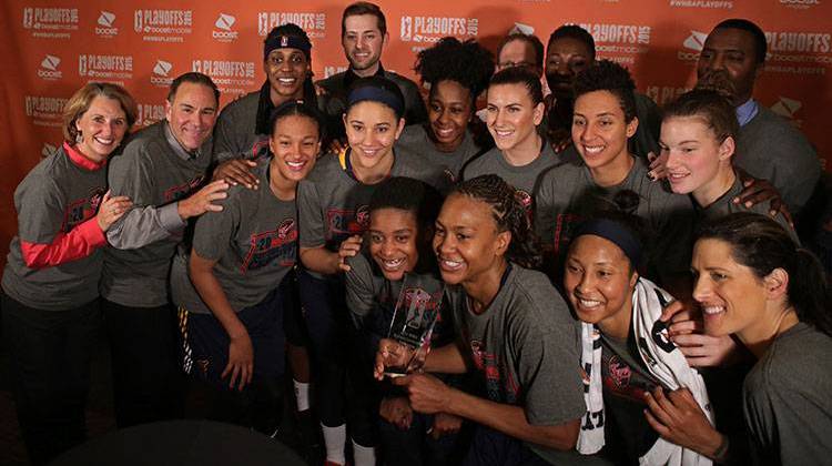 The Indiana Fever pose with the trophy after defeating the New York Liberty in Game 3 of the WNBA basketball Eastern Conference finals at Madison Square Garden in New York, Tuesday, Sept. 29, 2015. The Fever defeated the Liberty and will take on the Minnesota Lynx in the WNBA finals. - AP Photo/Adam Hunger