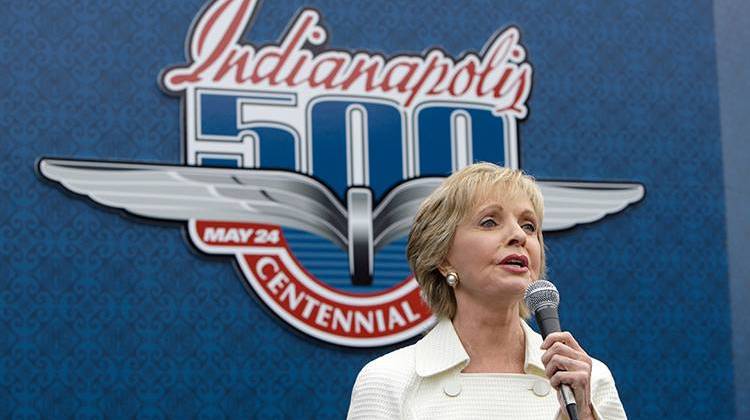 In this May 24, 2009, file photo, singer and actress Florence Henderson sings "God Bless America" before the 93rd running of the Indianapolis 500 auto race at the Indianapolis Motor Speedway in Indianapolis. Henderson will be the grand marshal for the 100th running of the Indianapolis 500 next weekend.  - AP Photo/Darron Cummings