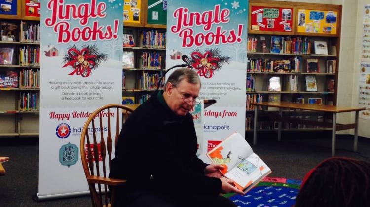Indianapolis Mayor Greg Ballard reads the Dr. Seuss book "Green Eggs and Ham" to children at Indianapolis Public Library's Eagle Branch on Tuesday, Dec. 16, 2014. - Eric Weddle/WFYI