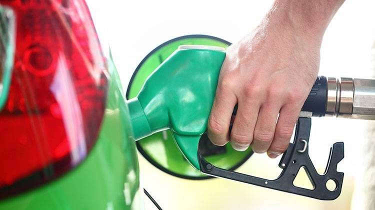 Indiana's current statewide average for self-serve regular unleaded is $2.40. At this time last year, Hoosiers were paying $3.38. - stock photo