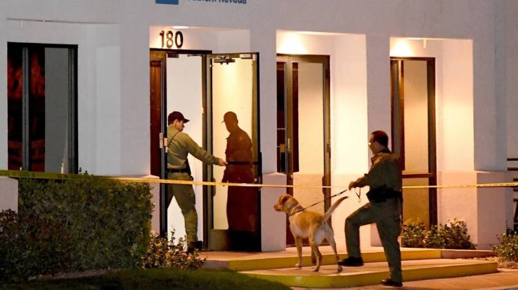Las Vegas Metropolitan Police Department K-9 officers search the Jewish Community Center of Southern Nevada after an employee received a suspicious phone call that led about 10 people to evacuate the building on Feb. 27. Jewish institutions across the nation have received more than 120 bomb threats in the past two months