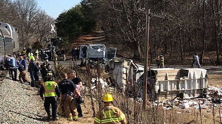 This photo provided by Rep. Greg Walden, R-Oregon, shows a crash site near Crozet, Va., Wednesday, Jan. 31, 2018. A chartered train carrying dozens of GOP lawmakers to a Republican retreat in West Virginia struck a garbage truck south of Charlottesville, Virginia on Wednesday, lawmakers said. - Rep. Greg Walden via AP