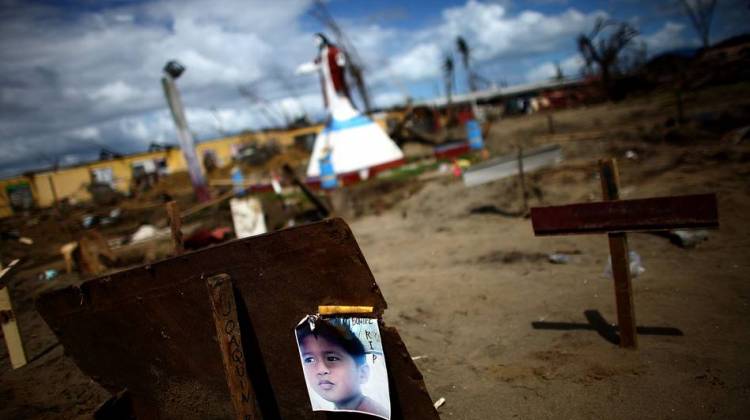 Filipino Priest Suffers With His Flock Amid Typhoon's Ruins