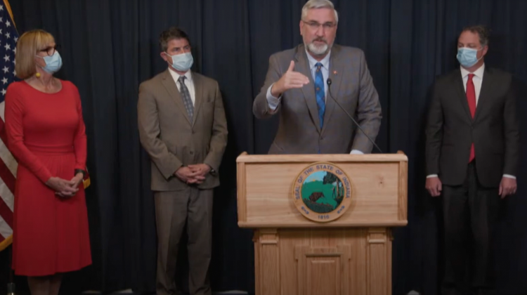 Gov. Eric Holcomb, center, discusses the new state budget alongside, from left to right, Lt. Gov. Suzanne Crouch, Senate President Pro Tem Rodric Bray (R-Martinsville) and House Speaker Todd Huston (R-Fishers). - Screenshot from YouTube