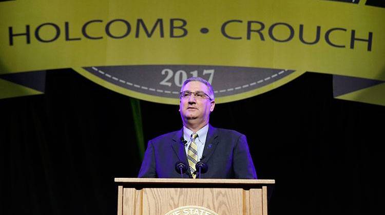 Eric Holcomb address the crowd after he was sworn in as Indiana's governor during an inaugural ceremony Monday, Jan. 9, 2017, in Indianapolis. - AP Photo/Darron Cummings, Pool